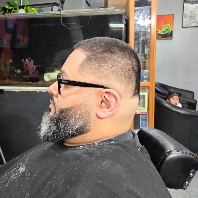 Shaped full beard with a sharp cheek line