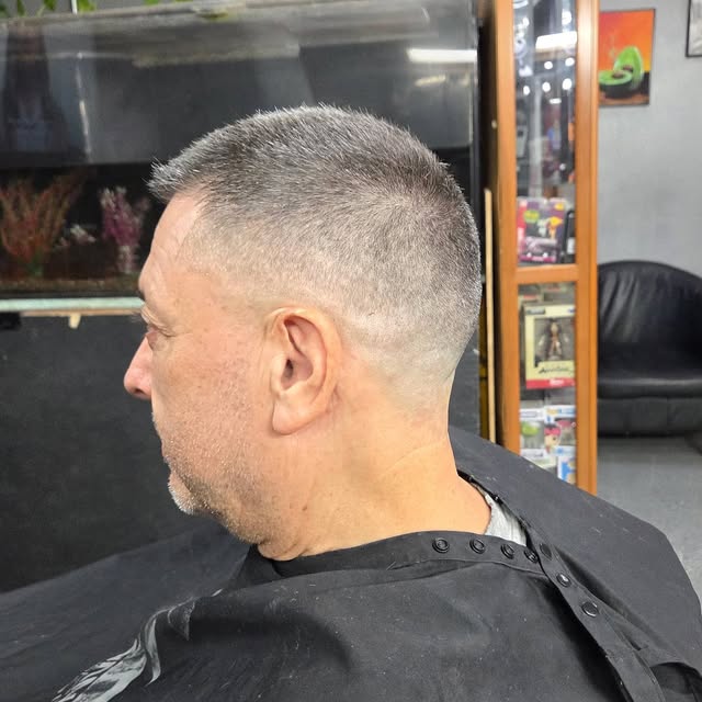 Close-cropped fade with a clean blend